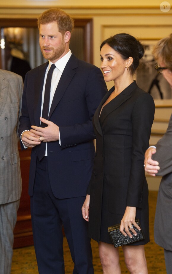 Le prince Harry, duc de Sussex et Meghan Markle, duchesse de Sussex, assistent à la comédie musicale "Hamilton" au théâtre Victoria Palace à Londres le 29 août 2018.