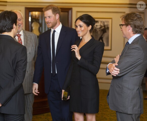 Le prince Harry, duc de Sussex et Meghan Markle, duchesse de Sussex, assistent à la comédie musicale "Hamilton" au théâtre Victoria Palace à Londres le 29 août 2018.