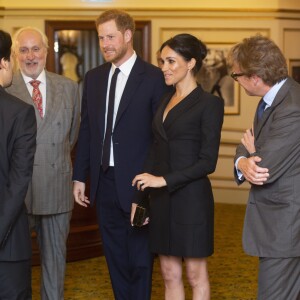 Le prince Harry, duc de Sussex et Meghan Markle, duchesse de Sussex, assistent à la comédie musicale "Hamilton" au théâtre Victoria Palace à Londres le 29 août 2018.