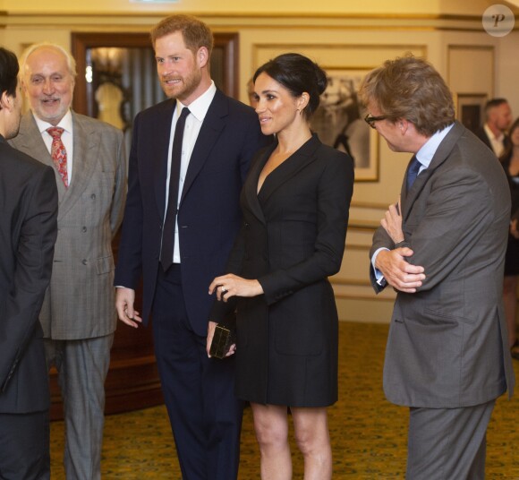 Le prince Harry, duc de Sussex et Meghan Markle, duchesse de Sussex, assistent à la comédie musicale "Hamilton" au théâtre Victoria Palace à Londres le 29 août 2018.