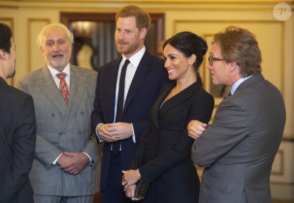 Le prince Harry, duc de Sussex et Meghan Markle, duchesse de Sussex, assistent à la comédie musicale "Hamilton" au théâtre Victoria Palace à Londres le 29 août 2018.