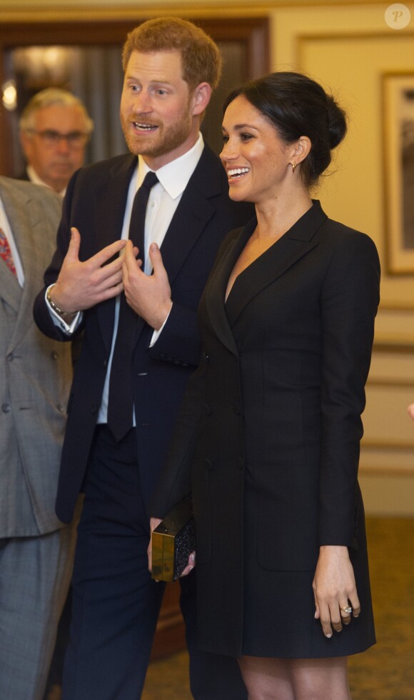 Le prince Harry, duc de Sussex et Meghan Markle, duchesse de Sussex, assistent à la comédie musicale "Hamilton" au théâtre Victoria Palace à Londres le 29 août 2018.