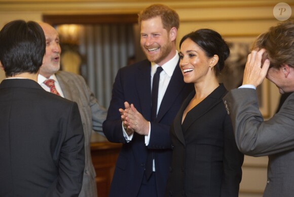 Le prince Harry, duc de Sussex et Meghan Markle, duchesse de Sussex, assistent à la comédie musicale "Hamilton" au théâtre Victoria Palace à Londres le 29 août 2018.