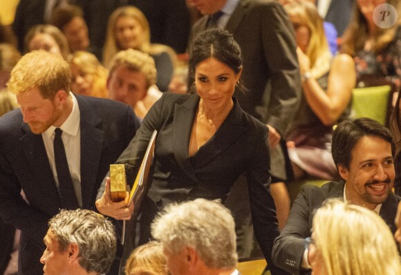 Le prince Harry, duc de Sussex et Meghan Markle, duchesse de Sussex, assistent à la comédie musicale "Hamilton" au théâtre Victoria Palace à Londres le 29 août 2018.