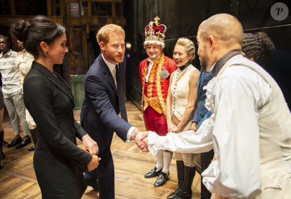Le prince Harry, duc de Sussex et Meghan Markle, duchesse de Sussex, assistent à la comédie musicale "Hamilton" au théâtre Victoria Palace à Londres le 29 août 2018.