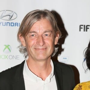 Gilles Verdez et sa compagne Fatou - Soirée de lancement du jeu vidéo "FIFA 2016" au Faust à Paris, le 21 septembre 2015