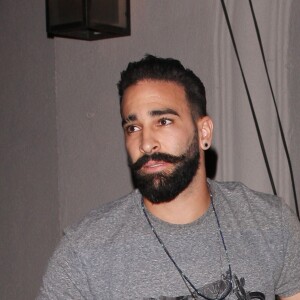 Adil Rami et Pamela Anderson au restaurant Craig's à Los Angeles le 24 juillet 2018.