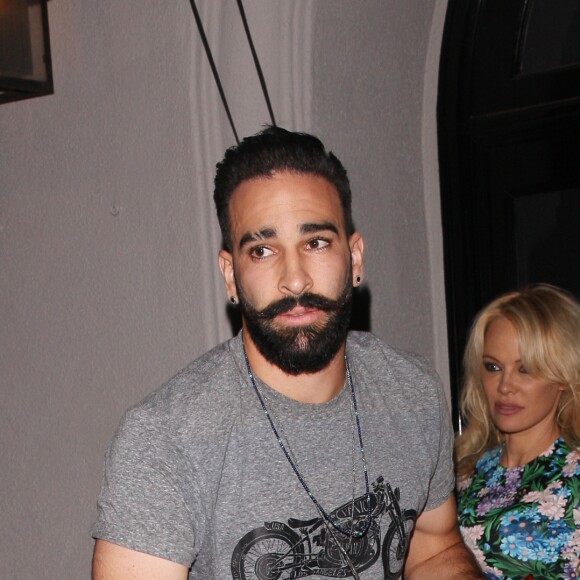 Adil Rami et Pamela Anderson au restaurant Craig's à Los Angeles le 24 juillet 2018.