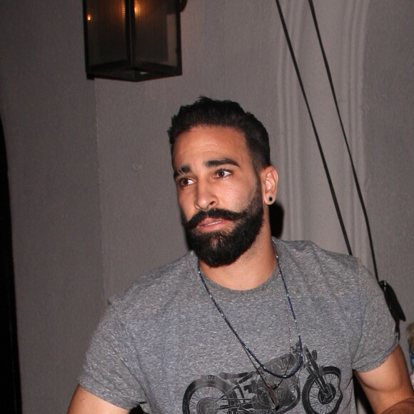 Adil Rami et Pamela Anderson au restaurant Craig's à Los Angeles le 24 juillet 2018.