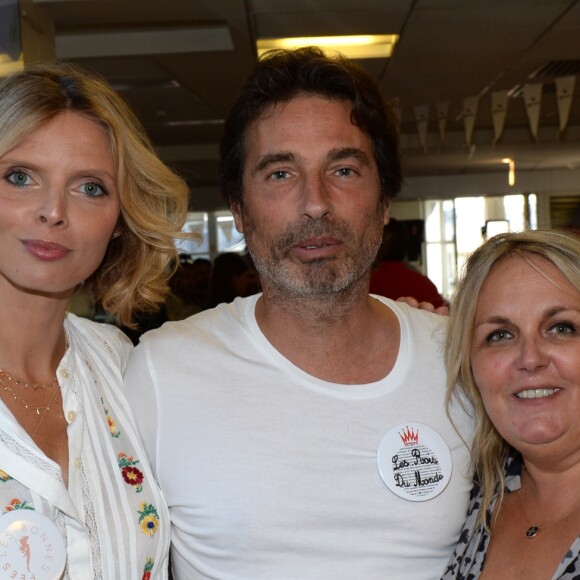 Sylvie Tellier (directrice générale de la Société Miss France et Miss France 2002), Richard Orlinski et Valérie Damidot lors de la 14e édition du Charity Day dans la salle des marchés de la société de courtage Aurel BGC au profit des 7 associations participantes à Paris, le 11 septembre 2018. © Veeren/Bestimage