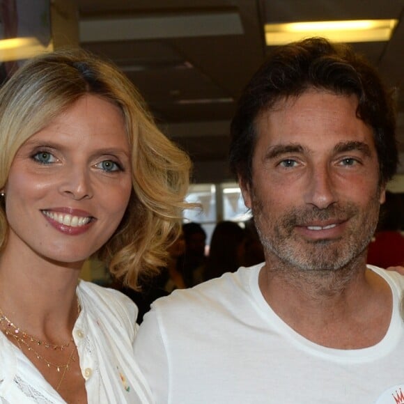 Sylvie Tellier (directrice générale de la Société Miss France et Miss France 2002), Richard Orlinski et Valérie Damidot lors de la 14e édition du Charity Day dans la salle des marchés de la société de courtage Aurel BGC au profit des 7 associations participantes à Paris, le 11 septembre 2018. © Veeren/Bestimage