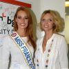 Maëva Coucke (Miss France 2018) et Sylvie Tellier (directrice générale de la Société Miss France et Miss France 2002) lors de la 14e édition du Charity Day dans la salle des marchés de la société de courtage Aurel BGC au profit des 7 associations participantes à Paris, le 11 septembre 2018. © Veeren/Bestimage
