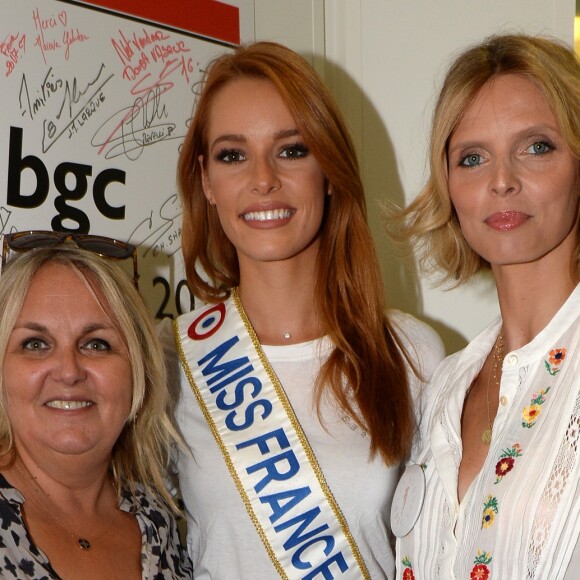 Valérie Damidot, Maëva Coucke (Miss France 2018) et Sylvie Tellier (directrice générale de la Société Miss France et Miss France 2002) lors de la 14e édition du Charity Day dans la salle des marchés de la société de courtage Aurel BGC au profit des 7 associations participantes à Paris, le 11 septembre 2018. © Veeren/Bestimage