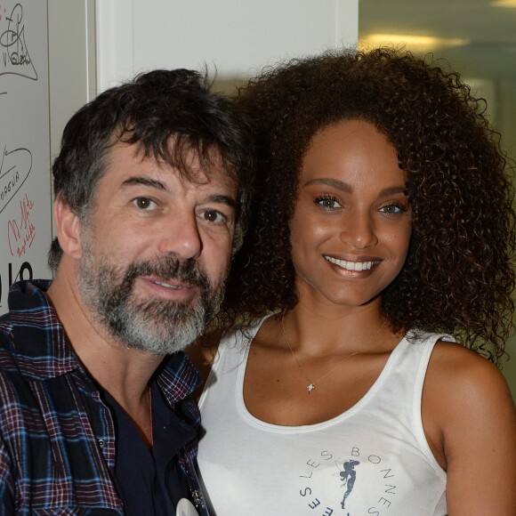 Stéphane Plaza et Alicia Aylies (Miss France 2017) lors de la 14e édition du Charity Day dans la salle des marchés de la société de courtage Aurel BGC au profit des 7 associations participantes à Paris, le 11 septembre 2018. © Veeren/Bestimage