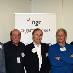 Ancien joueurs de l'équipe de Saint Etienne : Christian Sarramagna, Osvaldo Piazza, Hervé Revelli, Ivan Curkovic, Jean-Michel Larqué et Dominique Bathenay lors de la 14e édition du Charity Day dans la salle des marchés de la société de courtage Aurel BGC au profit des 7 associations participantes à Paris, le 11 septembre 2018. © Veeren/Bestimage