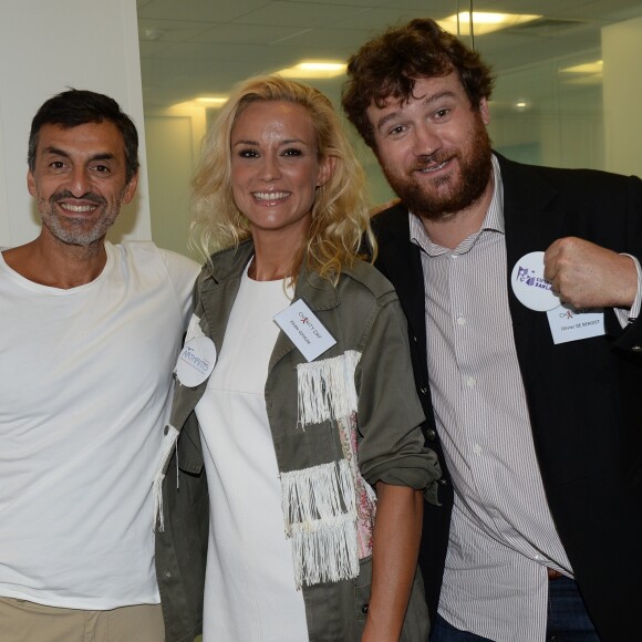 Albert Spano, Elodie Gossuin-Lacherie (Miss France 2001) et Olivier de Benoist lors de la 14e édition du Charity Day dans la salle des marchés de la société de courtage Aurel BGC au profit des 7 associations participantes à Paris, le 11 septembre 2018. © Veeren/Bestimage