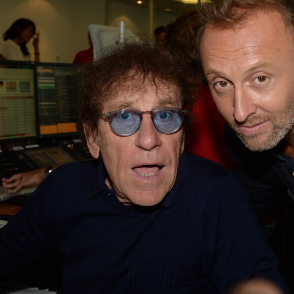 Alain Souchon et son fils Pierre lors de la 14e édition du Charity Day dans la salle des marchés de la société de courtage Aurel BGC au profit des 7 associations participantes à Paris, le 11 septembre 2018. © Veeren/Bestimage