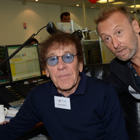 Alain Souchon et son fils Pierre lors de la 14e édition du Charity Day dans la salle des marchés de la société de courtage Aurel BGC au profit des 7 associations participantes à Paris, le 11 septembre 2018. © Veeren/Bestimage