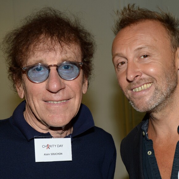 Alain Souchon et son fils Pierre lors de la 14e édition du Charity Day dans la salle des marchés de la société de courtage Aurel BGC au profit des 7 associations participantes à Paris, le 11 septembre 2018. © Veeren/Bestimage