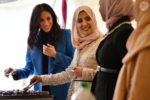 La duchesse Meghan de Sussex le 20 septembre 2018 au palais de Kensington pour le lancement du livre de recettes de cuisine Together, our community cookbook qu'elle a préfacé.