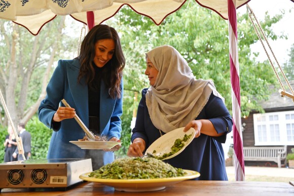 La duchesse Meghan de Sussex le 20 septembre 2018 au palais de Kensington pour le lancement du livre de recettes de cuisine Together, our community cookbook qu'elle a préfacé.