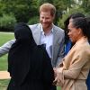 La duchesse Meghan de Sussex (Meghan Markle), son mari le prince Harry et sa mère Doria Ragland arrivant le 20 septembre 2018 au palais de Kensington pour le lancement du livre de recettes de cuisine Together, our community cookbook qu'elle a préfacé.