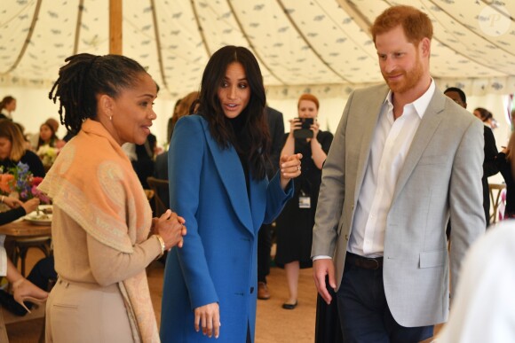La duchesse Meghan de Sussex avec sa mère Doria Ragland et le prince Harry le 20 septembre 2018 au palais de Kensington pour le lancement du livre de recettes de cuisine Together, our community cookbook qu'elle a préfacé.