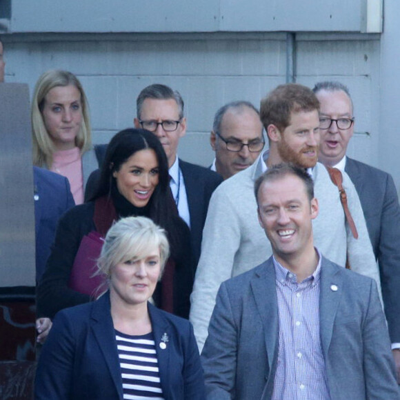 Le prince Harry, duc de Sussex, et Meghan Markle, duchesse de Sussex (enceinte) arrivent à l'aéroport de Sydney dans le cadre de leur tournée dans le Pacifique, le 15 octobre 2018, avant le début des Invictus Games.
