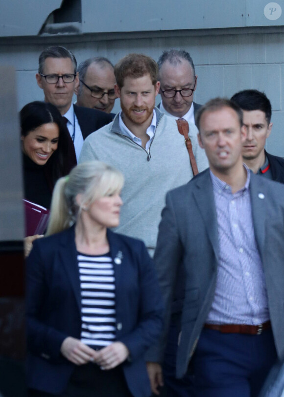 Le prince Harry, duc de Sussex, et Meghan Markle, duchesse de Sussex (enceinte) arrivent à l'aéroport de Sydney dans le cadre de leur tournée dans le Pacifique, le 15 octobre 2018, avant le début des Invictus Games.