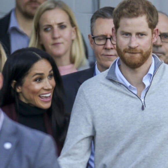 Meghan Markle et le prince Harry lors de leur arrivée à l'aéroport de Sydney, Australie, le 15 octobre 2018.