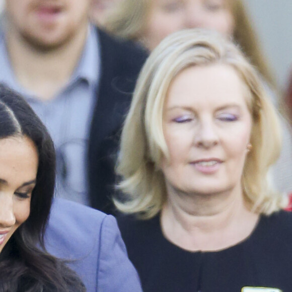Meghan Markle et le prince Harry lors de leur arrivée à l'aéroport de Sydney, Australie, le 15 octobre 2018.