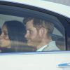 Meghan Markle et le prince Harry lors de leur arrivée à l'aéroport de Sydney, Australie, le 15 octobre 2018.