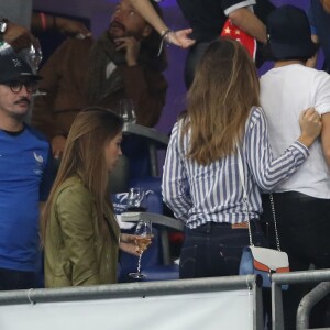 Iris Mittenaere (Miss France, Miss Univers 2016 et Danse avec les Stars 2018) et son partenaire de danse Anthony Colette dans les tribunes du stade de France lors du match de ligue des nations opposant la France à l'Allemagne à Saint-Denis, Seine Saint-Denis, France, le 16 octobre 2018.