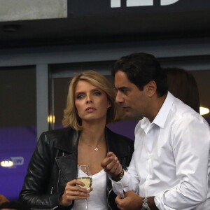 Sylvie Tellier (directrice générale de la Société Miss France et Miss France 2002) et son mari Laurent dans les tribunes du stade de France lors du match de ligue des nations opposant la France à l'Allemagne à Saint-Denis, Seine Saint-Denis, France, le 16 octobre 2018.