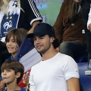 Le danseur Anthony Colette (Danse avec les Stars 2018) dans les tribunes du stade de France lors du match de ligue des nations opposant la France à l'Allemagne à Saint-Denis, Seine Saint-Denis, France, le 16 octobre 2018.