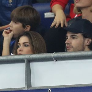 Iris Mittenaere (Miss France, Miss Univers 2016 et Danse avec les Stars 2018) et son partenaire de danse Anthony Colette dans les tribunes du stade de France lors du match de ligue des nations opposant la France à l'Allemagne à Saint-Denis, Seine Saint-Denis, France, le 16 octobre 2018.