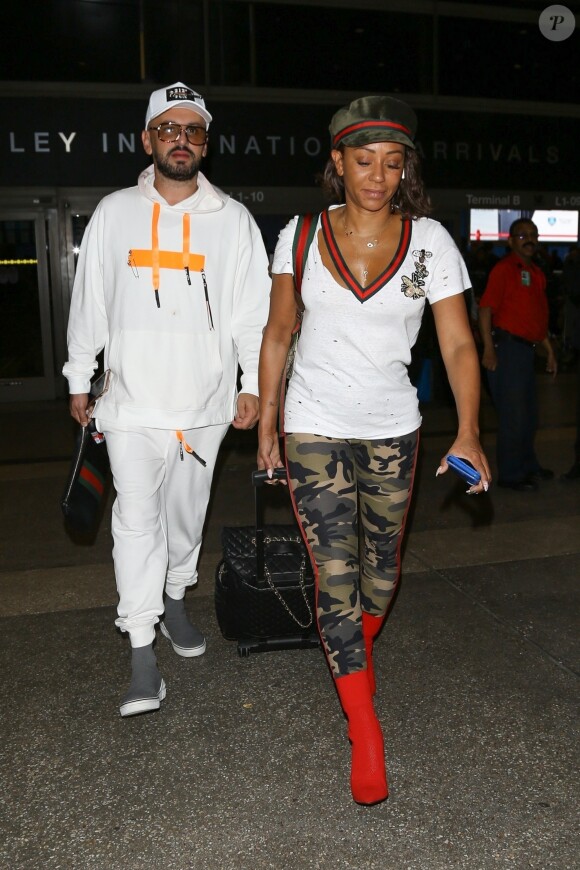 Exclusif - Mel B (Melanie Brown) et son meilleur ami Gary Madatyan arrivent à l'aéroport de LAX à Los Angeles, le 14 octobre 2018.