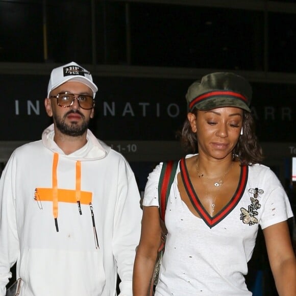 Exclusif - Mel B (Melanie Brown) et son meilleur ami Gary Madatyan arrivent à l'aéroport de LAX à Los Angeles, le 14 octobre 2018.