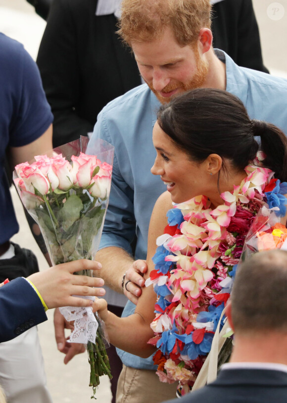 Le prince Harry, duc de Sussex, et Meghan Markle, duchesse de Sussex, visitent la plage de Bondi Beach. Sydney, le 19 octobre 2018.