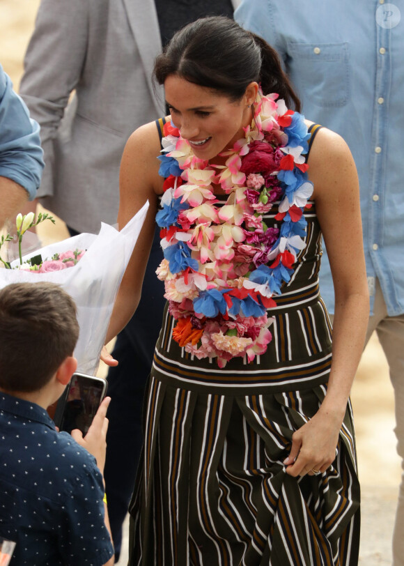 Le prince Harry, duc de Sussex, et Meghan Markle, duchesse de Sussex, visitent la plage de Bondi Beach. Sydney, le 19 octobre 2018.