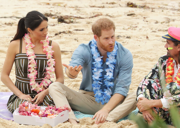 Le prince Harry, duc de Sussex, et Meghan Markle, duchesse de Sussex, visitent la plage de Bondi Beach. Sydney, le 19 octobre 2018.