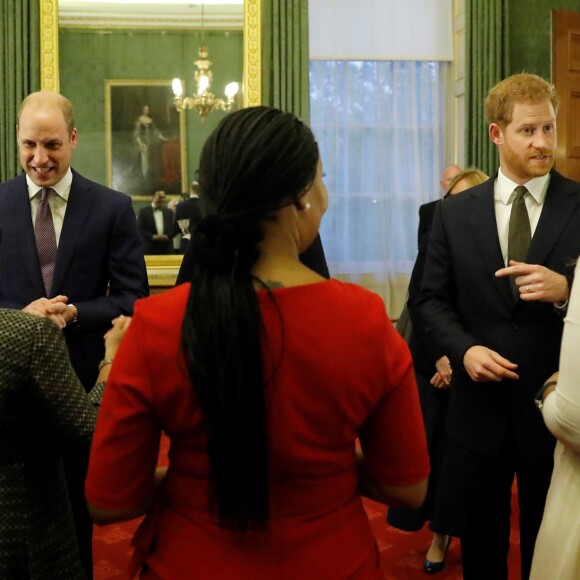 Le prince William, duc de Cambridge, et le prince Harry, duc de Sussex, réunis le 10 octobre 2018 à Londres lors de la conférence "2018 Illegal Wildlife Trade" au palais St James pour lutter contre le braconnage des espèces menacées.