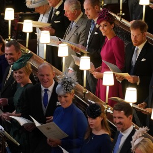 Le prince William, duc de Cambridge, la duchesse Catherine de Cambridge, le prince Harry, duc de Sussex, et la duchesse Meghan de Sussex lors du mariage de la princesse Eugenie d'York et Jack Brooksbank en la chapelle Saint-George au château de Windsor, le 12 octobre 2018.