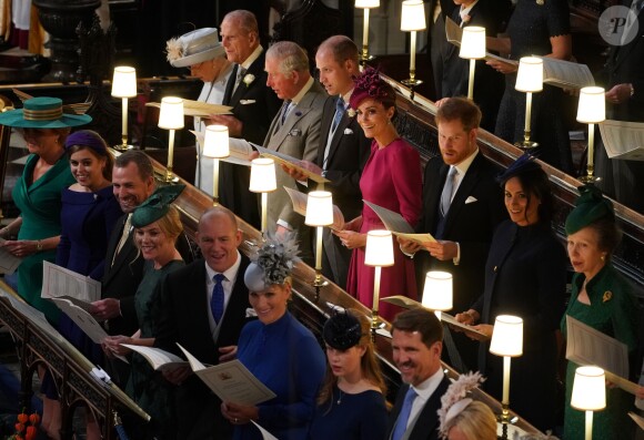 Le prince William, duc de Cambridge, la duchesse Catherine de Cambridge, le prince Harry, duc de Sussex, et la duchesse Meghan de Sussex lors du mariage de la princesse Eugenie d'York et Jack Brooksbank en la chapelle Saint-George au château de Windsor, le 12 octobre 2018.