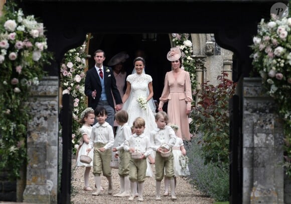 Pippa Middleton, son mari James Matthews, Catherine (Kate) Middleton, duchesse de Cambridge, le prince George de Cambridge et la princesse Charlotte de Cambridge - Mariage de P. Middleton et J. Matthew, en l'église St Mark Englefield, Berkshire, Royaume Uni, le 20 mai 2017.
