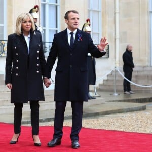 Le président de la République française Emmanuel Macron et sa femme la Première Dame Brigitte Macron (Trogneux) - Le président de la République française et sa femme la Première Dame reçoivent les présidents avant la cérémonie du Centenaire de l'Armistice de la Première Guerre Mondiale, au palais de l'Elysée à Paris, France, le 11 novembre 2018. © Stéphane Lemouton/Bestimage