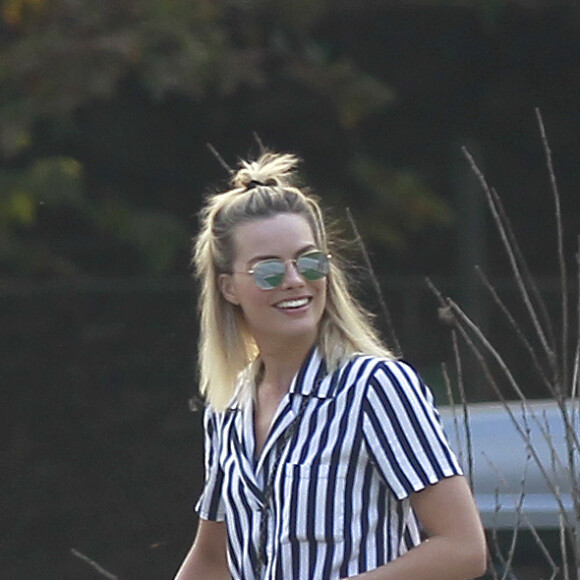 Exclusif - Margot Robbie, son mari Tom Ackerley et des amis jouent au golf à Los Angeles, le 11 novembre 2018.