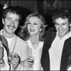 Jean Sarrus des Charlots, Caroline Cellier, Francis Perrin et Maria Pacôme en 1980 lors d'une soirée.