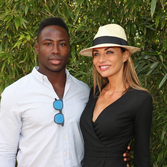 Ariane Brodier et son compagnon Fulgence Ouedraogo au village lors des internationaux de tennis de Roland Garros à Paris le 5 juin 2017. © Cyril Moreau / Dominique Jacovides / Bestimage