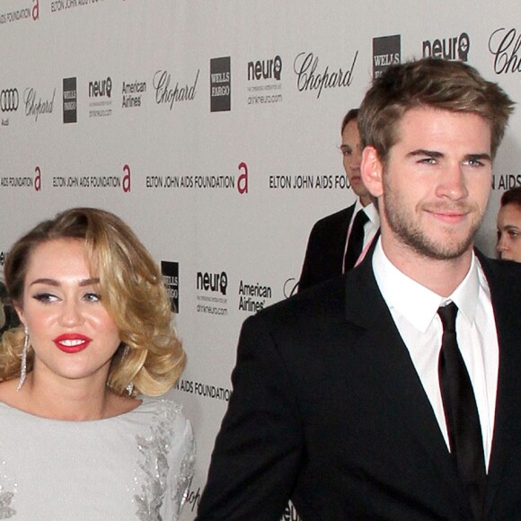 Liam Hemsworth et Miley Cyrus - Soirée pour les 20e Annual Academy Awards eu bénéfice de la fondation Elton John à West Hollywood le 26 février 2012.